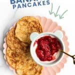 Pinterest Pin Showing Plate of Baby Banana Pancakes Served With Yogurt and Mashed Berries. Text Overlay Saying Baby Banana Pancakes.