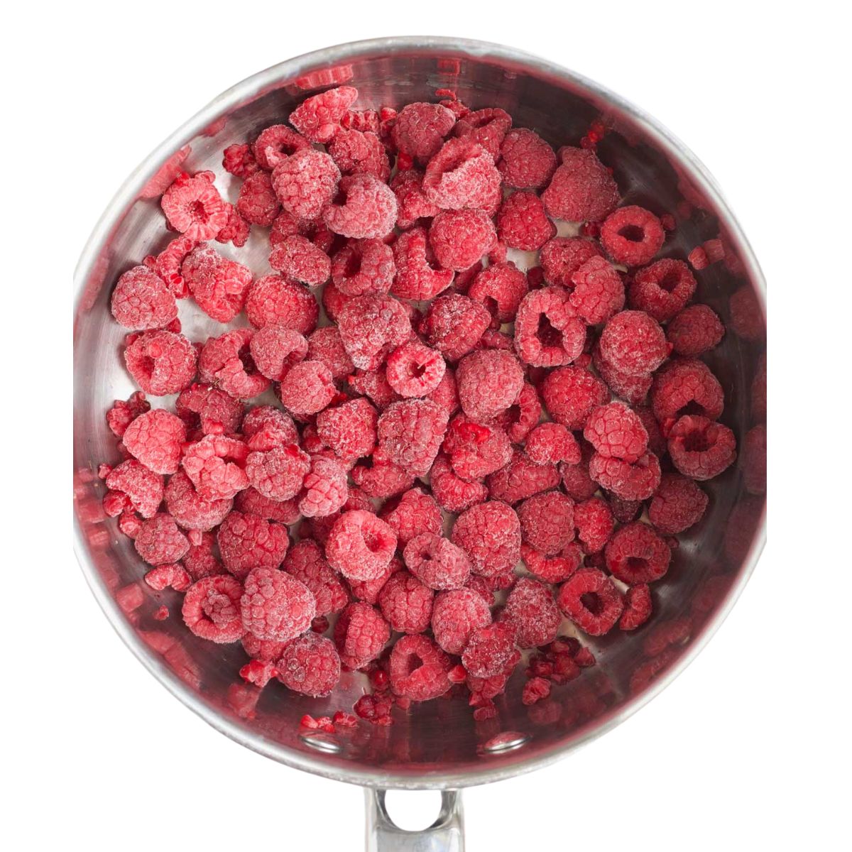 Frozen Raspberries in Pan Before Heating.