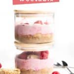 Two Stacked Glass Jars of Overnight Weetbix With Wheat Biscuits and Berries in Background. Text OVerlay "Overnight Weetbix"