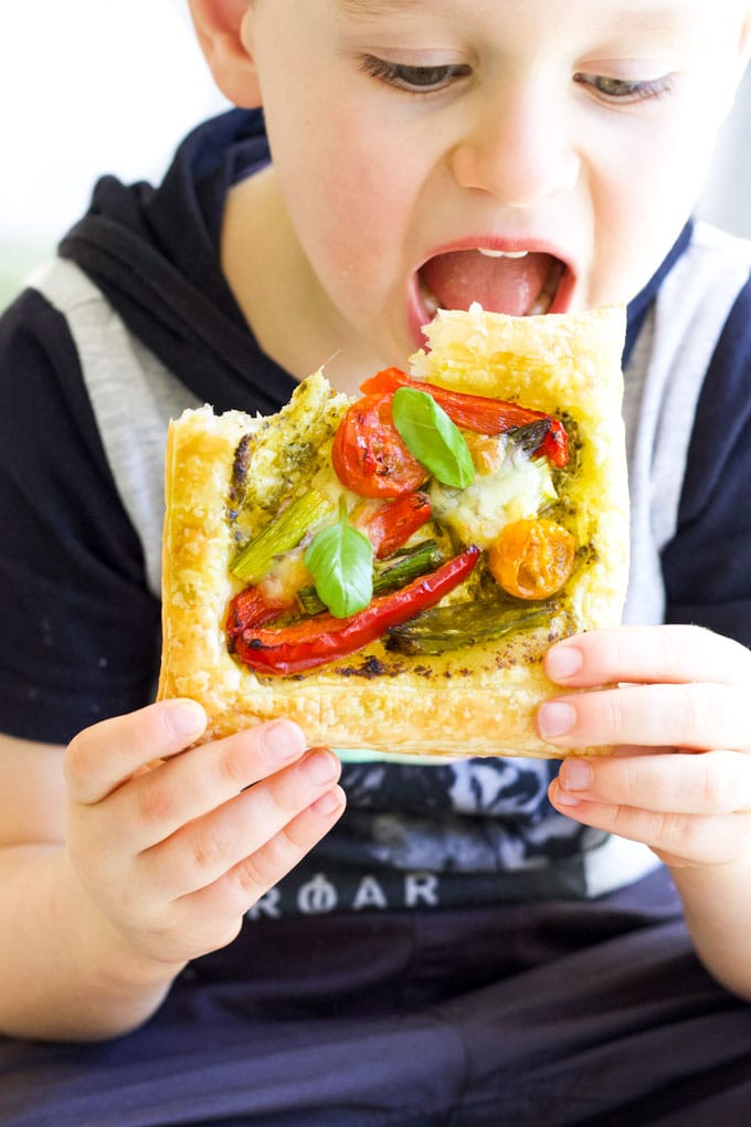 Child Eating Roast Vegetable Puff Pastry Tart