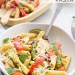 Bowl of Roasted Vegetable Pasta with Grated Parmesan on Top