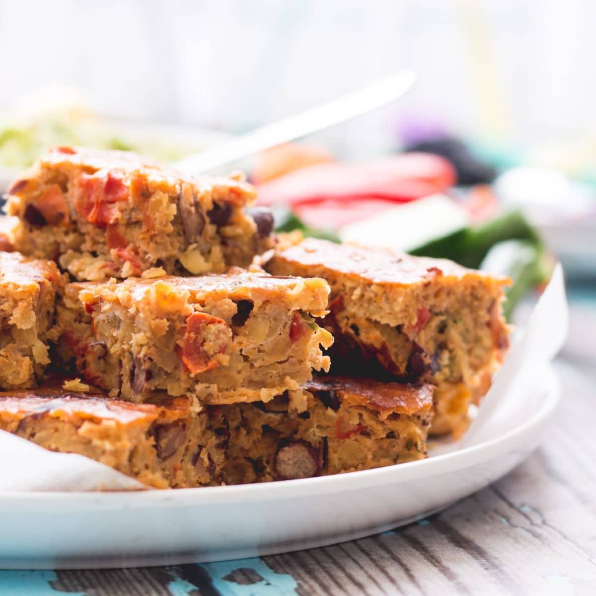 Veggie Lentil Slice Stacked on White Plate.