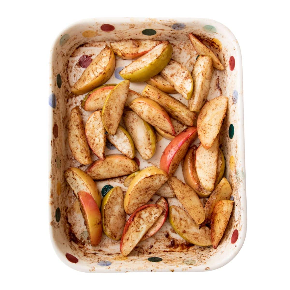 Cooked Apple Slices in Baking Dish. 