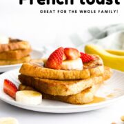 Pinterest Pin for Banana French Toast Showing Image of the Toast Stacked on a Plate Topped with Fruit.