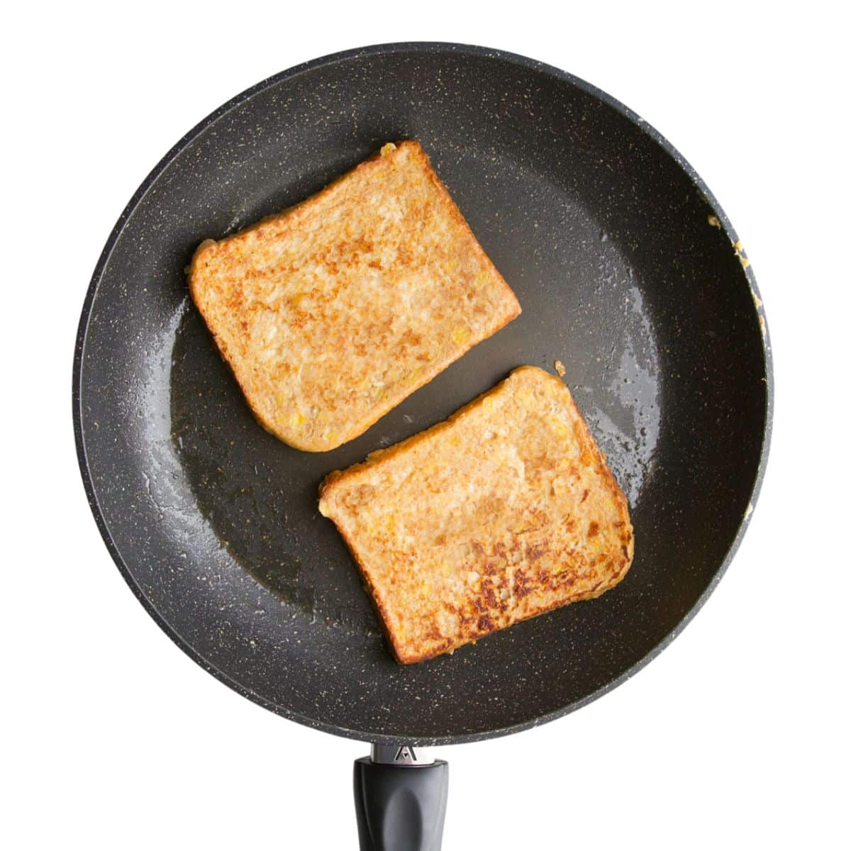 Cooked Banana French Toast in Frying Pan. 