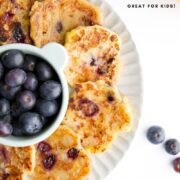 Pinterest Pin with Image of Banana Blueberry Fritters on Plate.