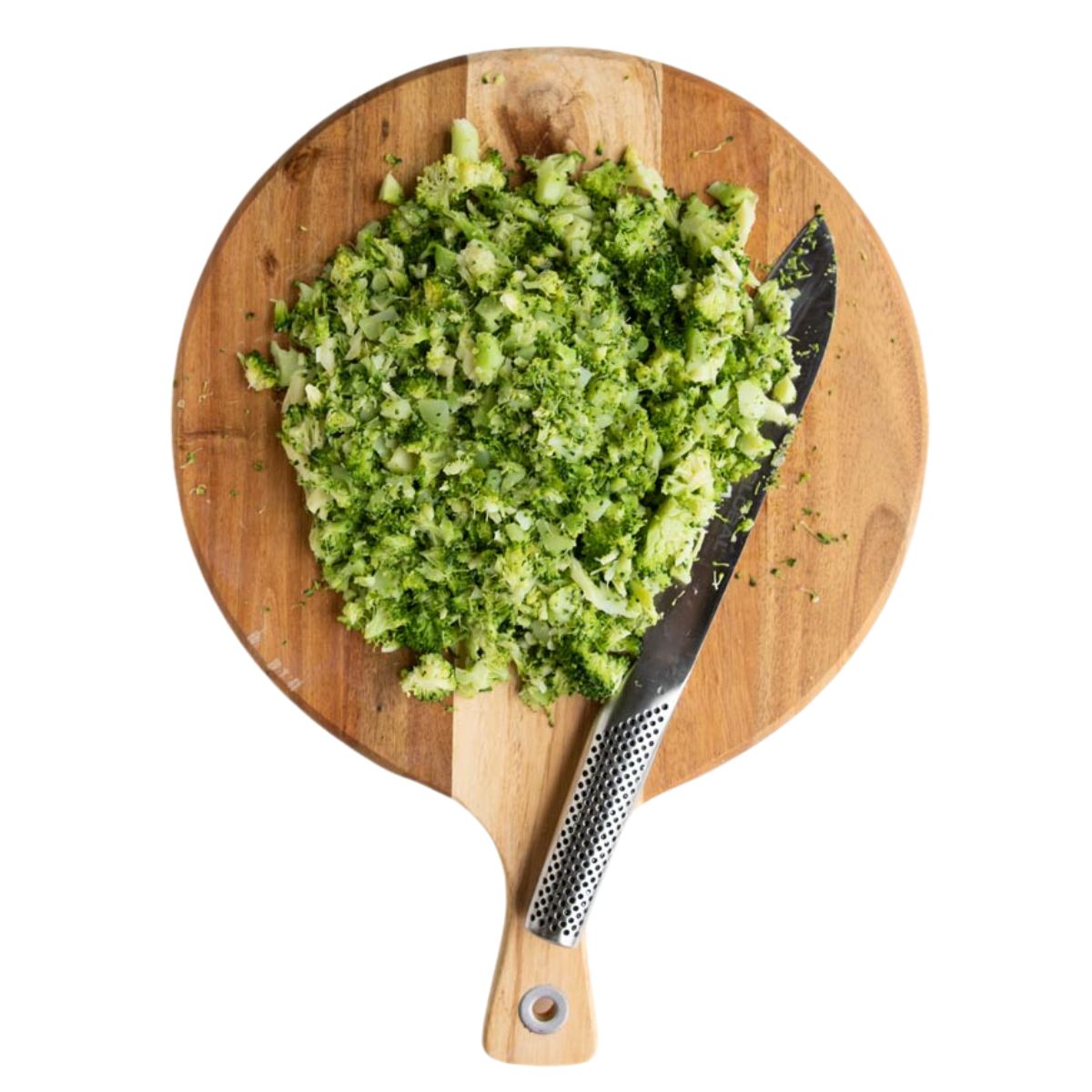 Chopped Steamed Broccoli on Wooden Board. 