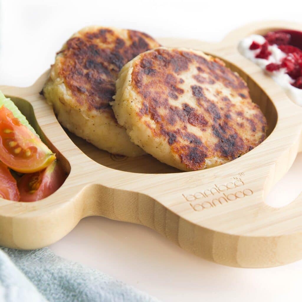 Two Bubble and Squeak Cakes in Wooden Toddler Plate