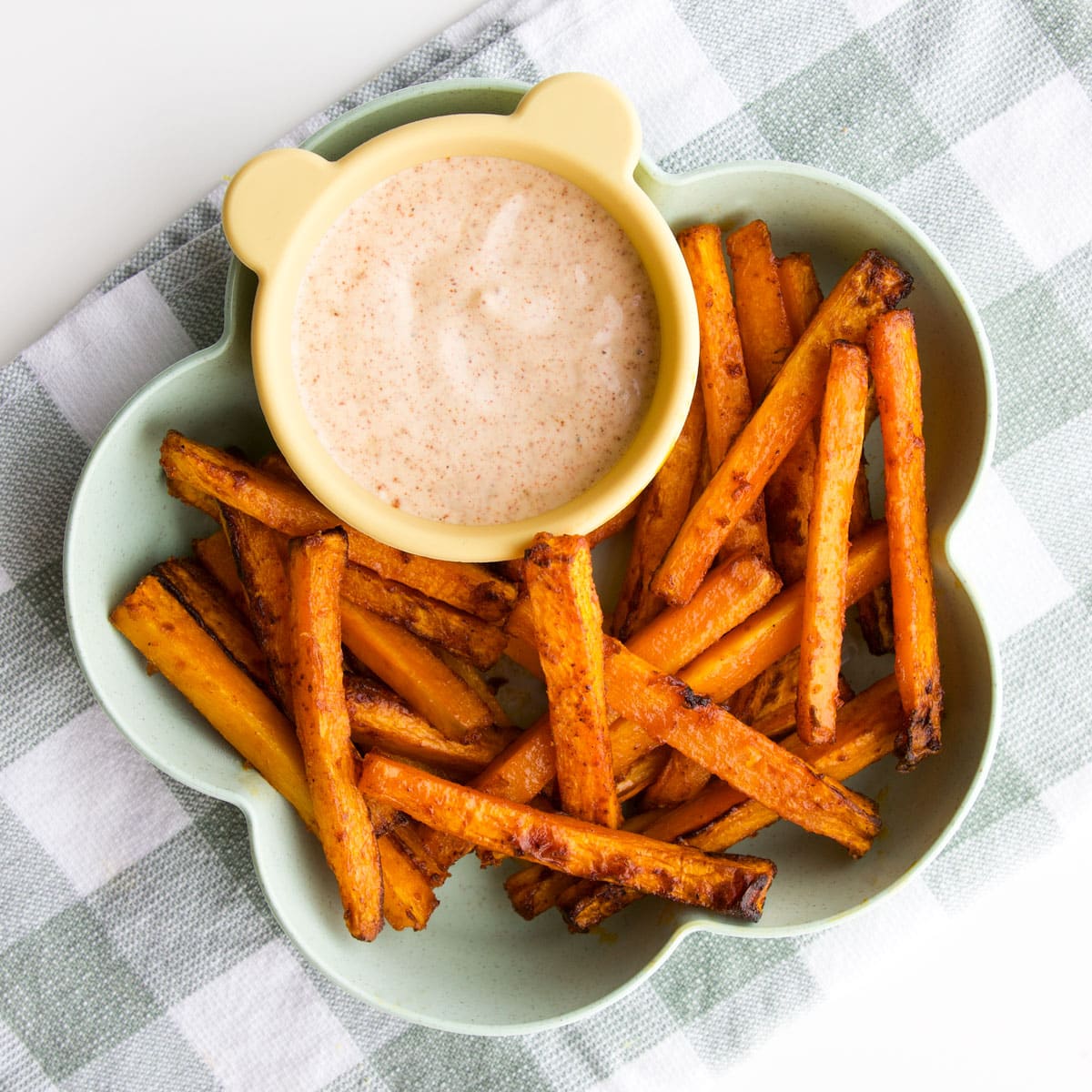 Carrot Fries in Toddler Flower Bowl Served with Paprika Dip. 