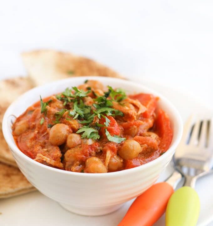 Chicken Chickpea Stew Served in Bowl with Pita Bread