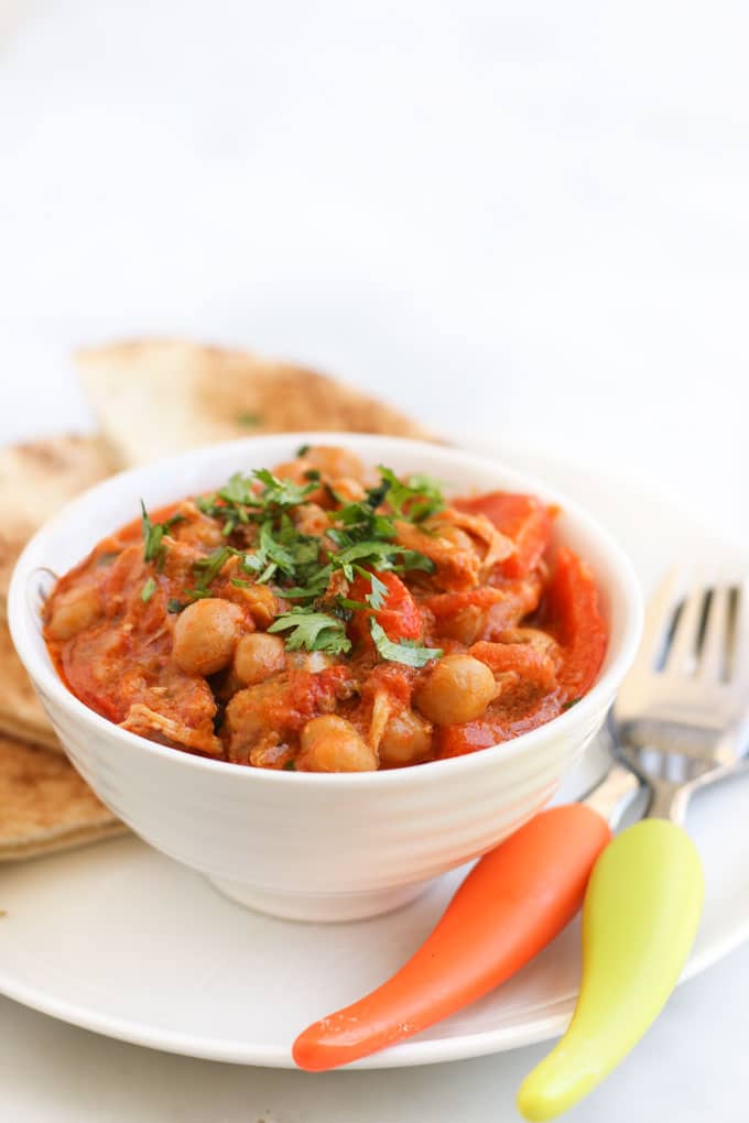 Chicken Chickpea Stew Served in Bowl with Pita Bread