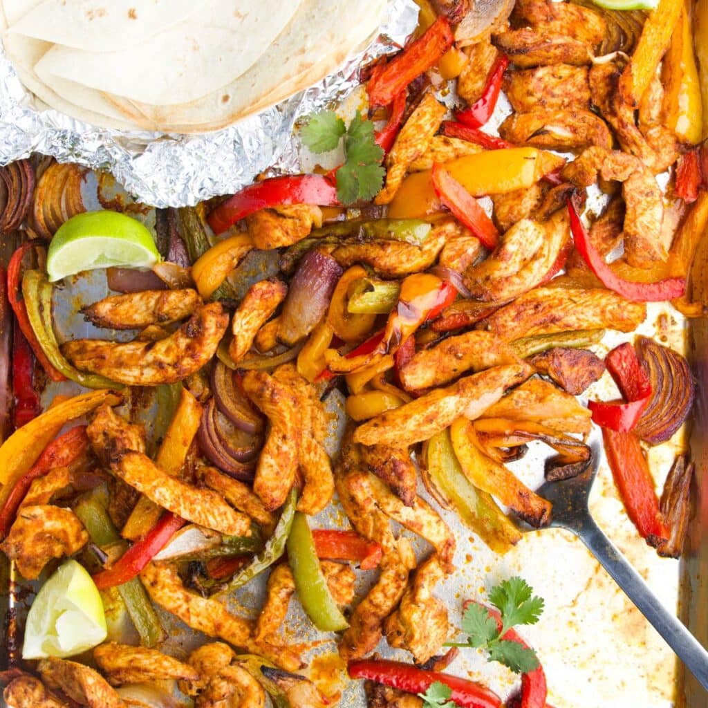 Close Up Top Down Shot of Chicken Fajitas on Baking Tray