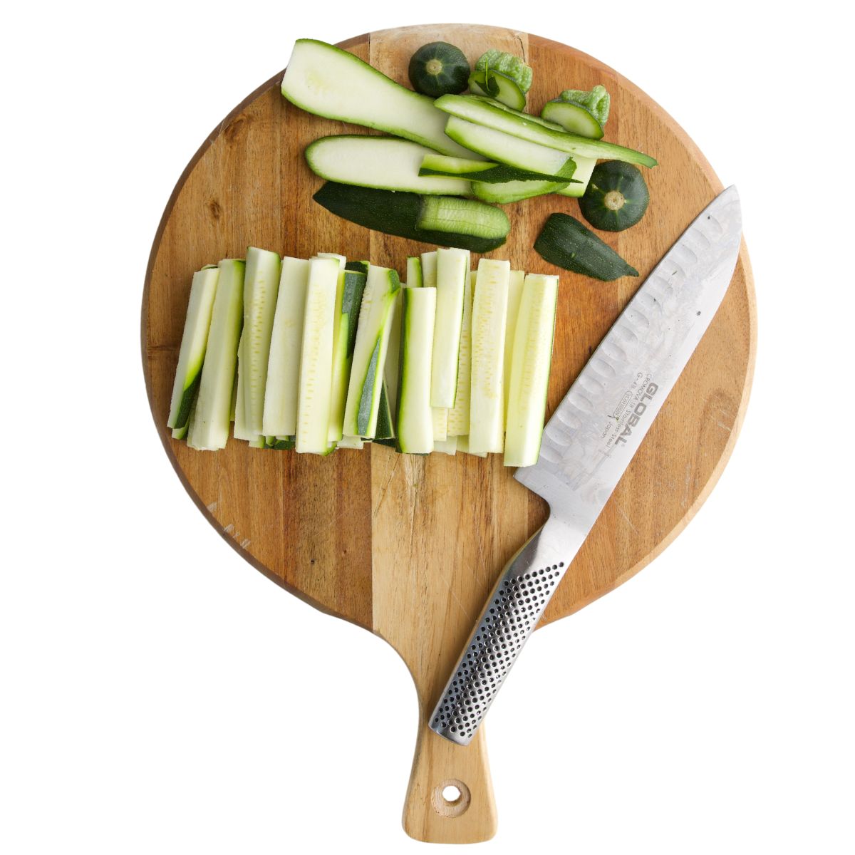 Courgette Battons Cut on Chopping Board. 