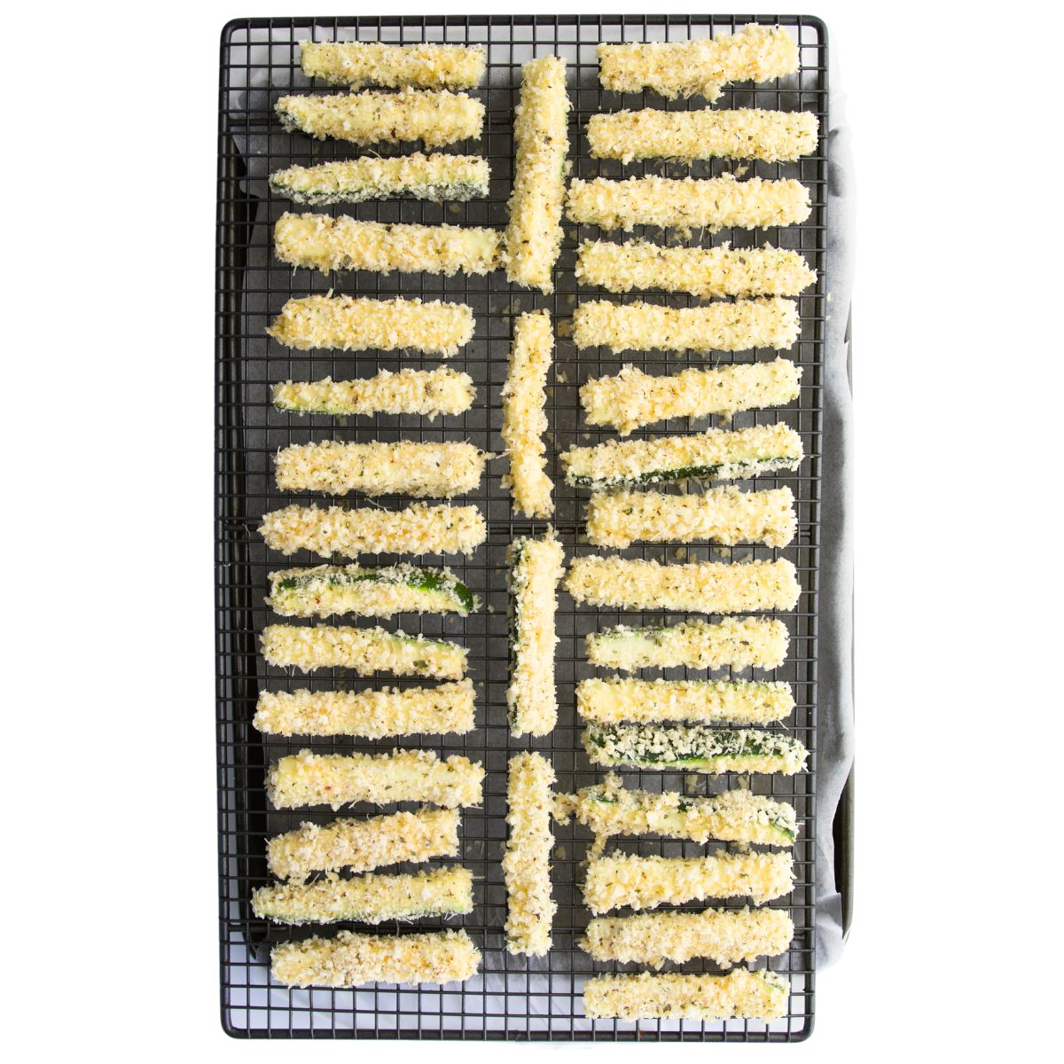 Courgette Fries (Uncooked) on Baking Tray. 