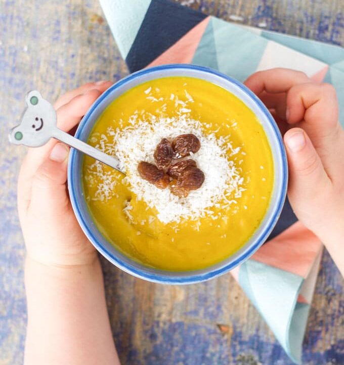 curried lentil and coconut soup. A deliciously spiced soup with sweet toppings to complement the spices. A fun and delicious soup for kids.