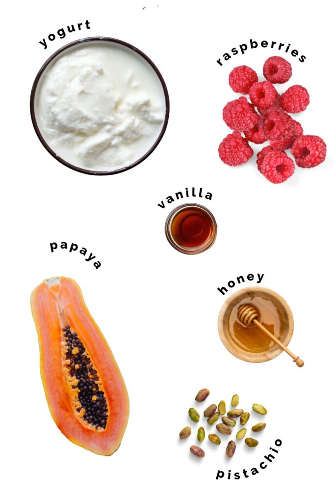 Ingredients Needed to Make Frozen Yogurt Bark on White Background.