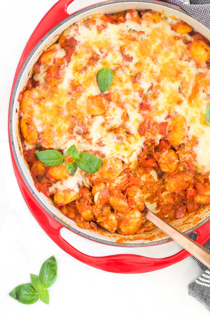 Gnocchi Bake in Dish With Portion Being Removed