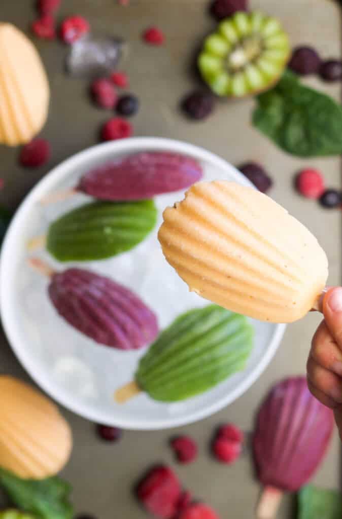 These healthy popsicles for babies and toddlers are a great frozen treat. Perfect for sore gums or on hot summer days. Each flavour has a hidden vegetable. #hiddenveg #babyfood #kidfood #babyledweaning #blw #kidsfood #healthypopsicles