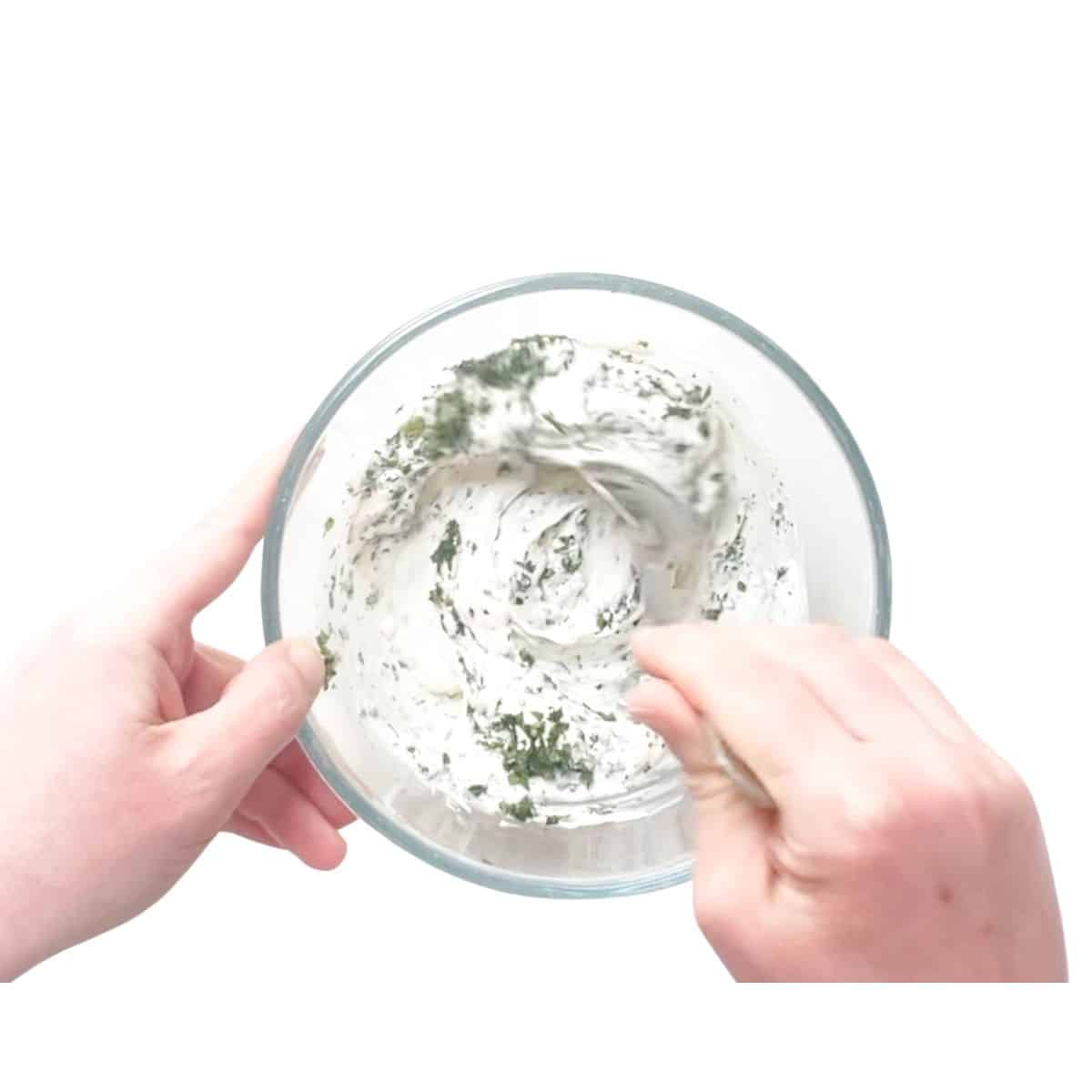 Mixing Mint Yogurt Dip in Bowl.