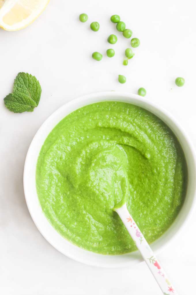 Pea Puree in Bowl with Ingredients Scattered