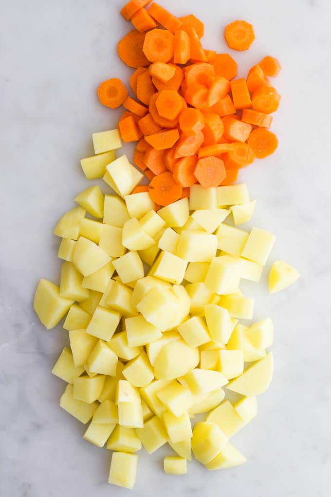 Potato and Carrots Peeled and Chopped Before Being Cooked