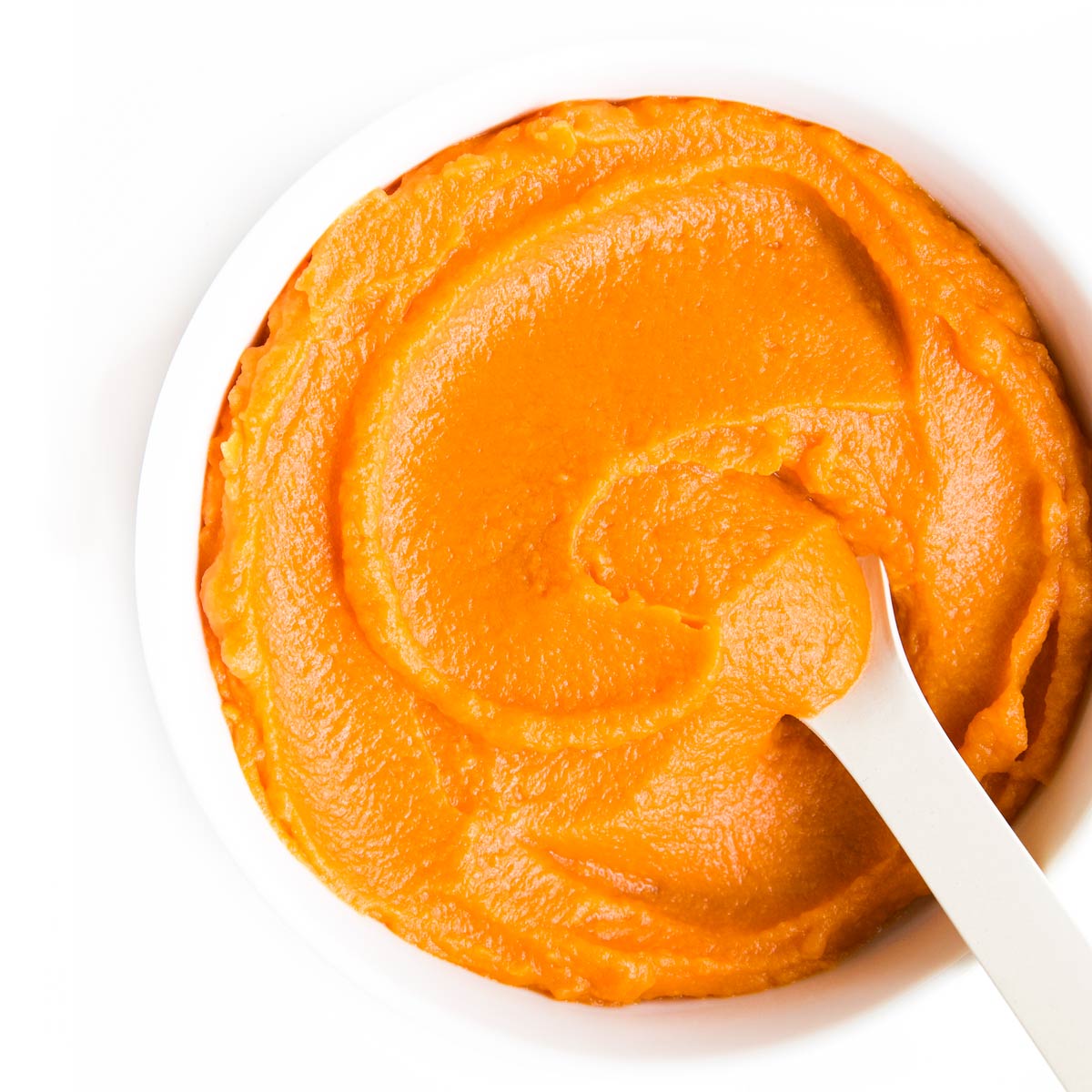 Sweet Potato Puree in White Bowl.