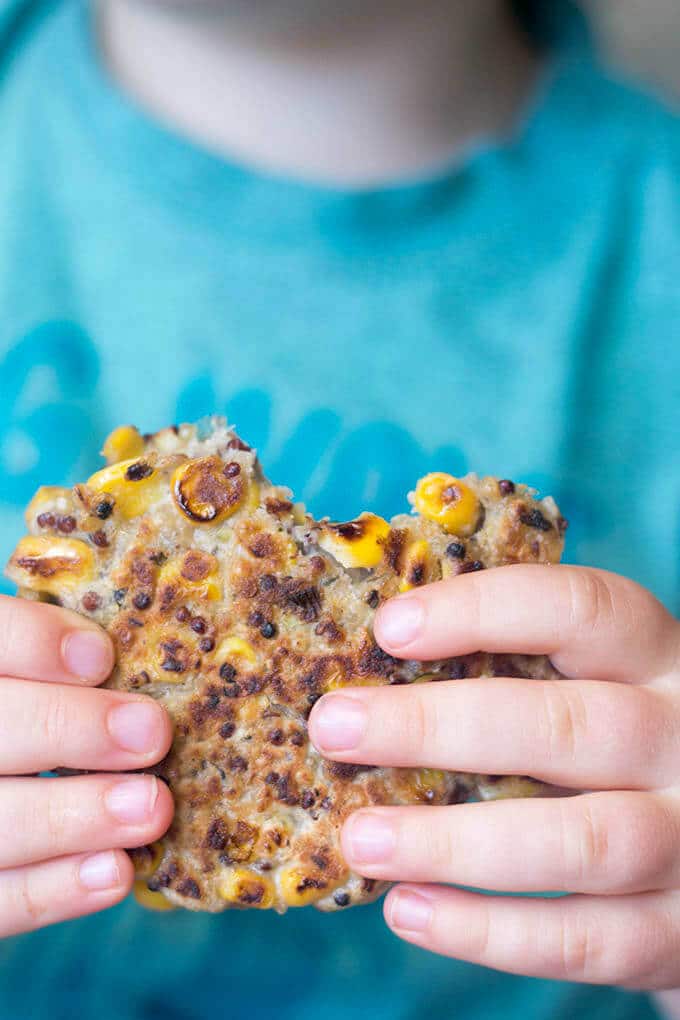 Child Holding Sweetcorn Fritter