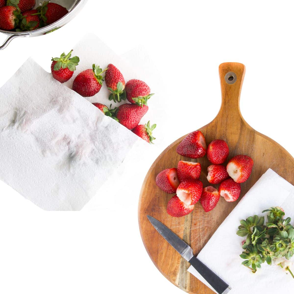 Washed Strawberries at the Left of The Picture Covered in Paper Towel to Dry. To the Right Strawberries Hulled with Greens and stems to the Side.